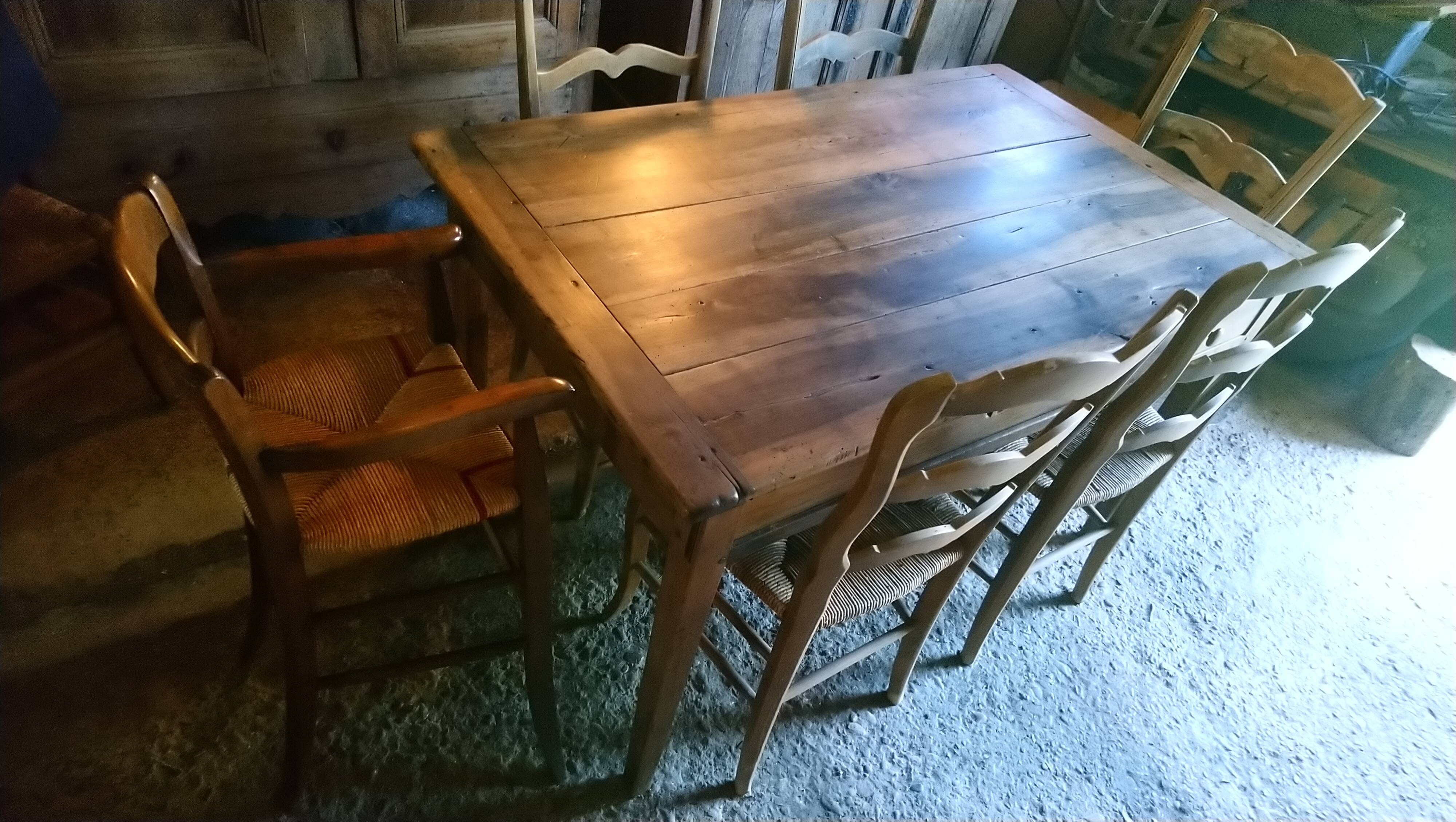 Child's high chair with a rush seat in walnut