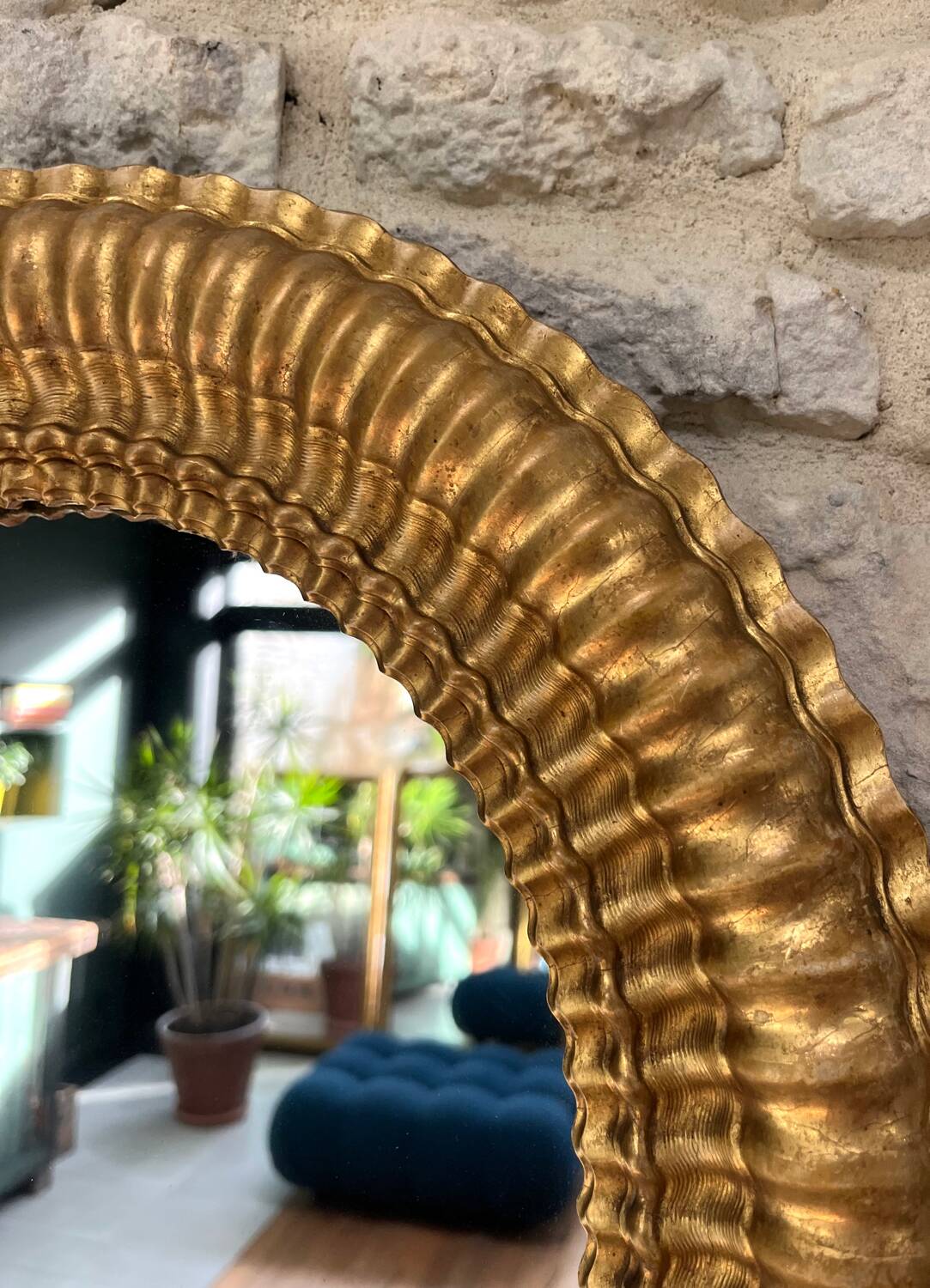 Pair of antique oval mirrors gilded with gold leaf and mercury.