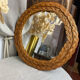 Mirror, 1970s, in woven wicker.