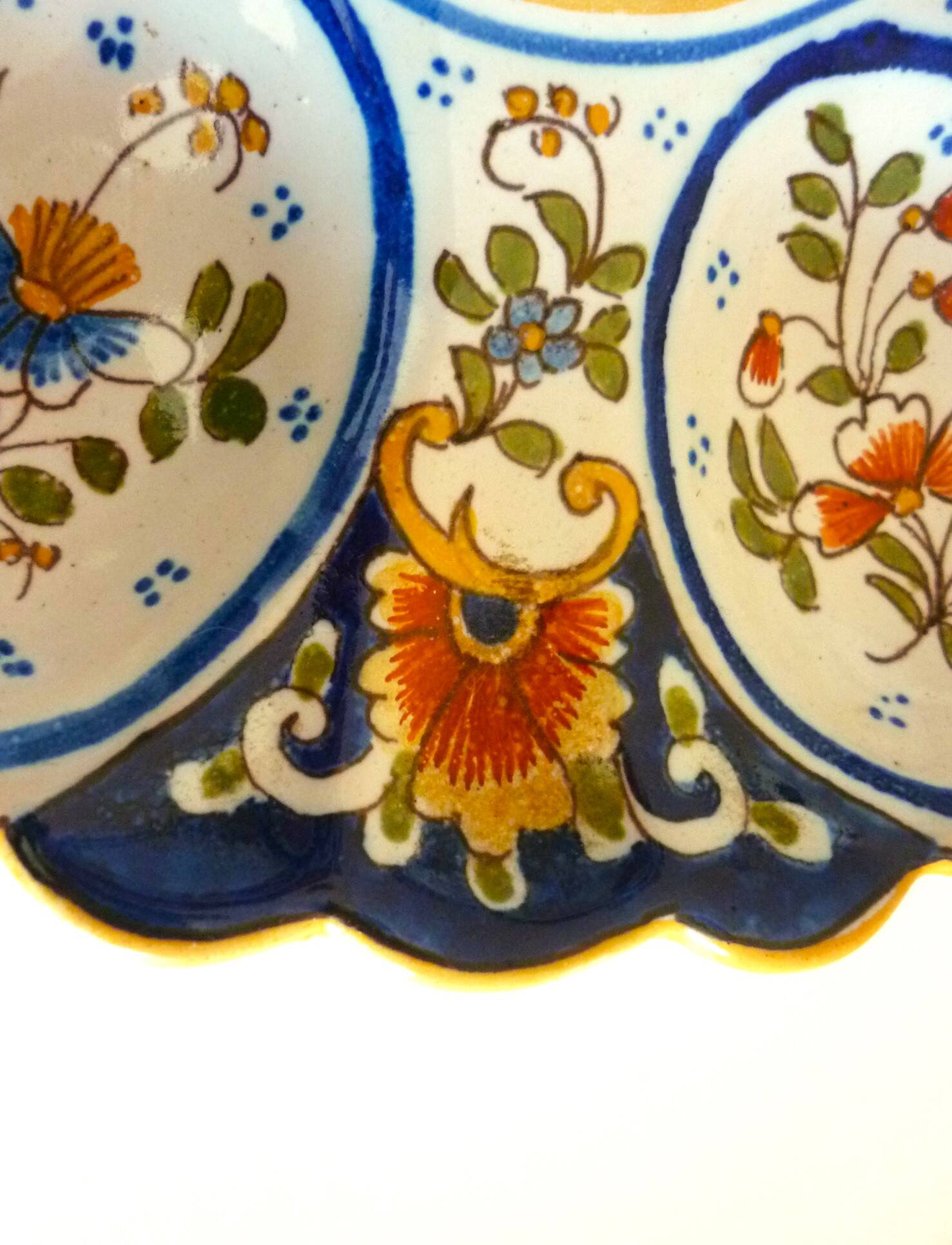 Dish, egg server in hand-painted earthenware, signed Geo Martel