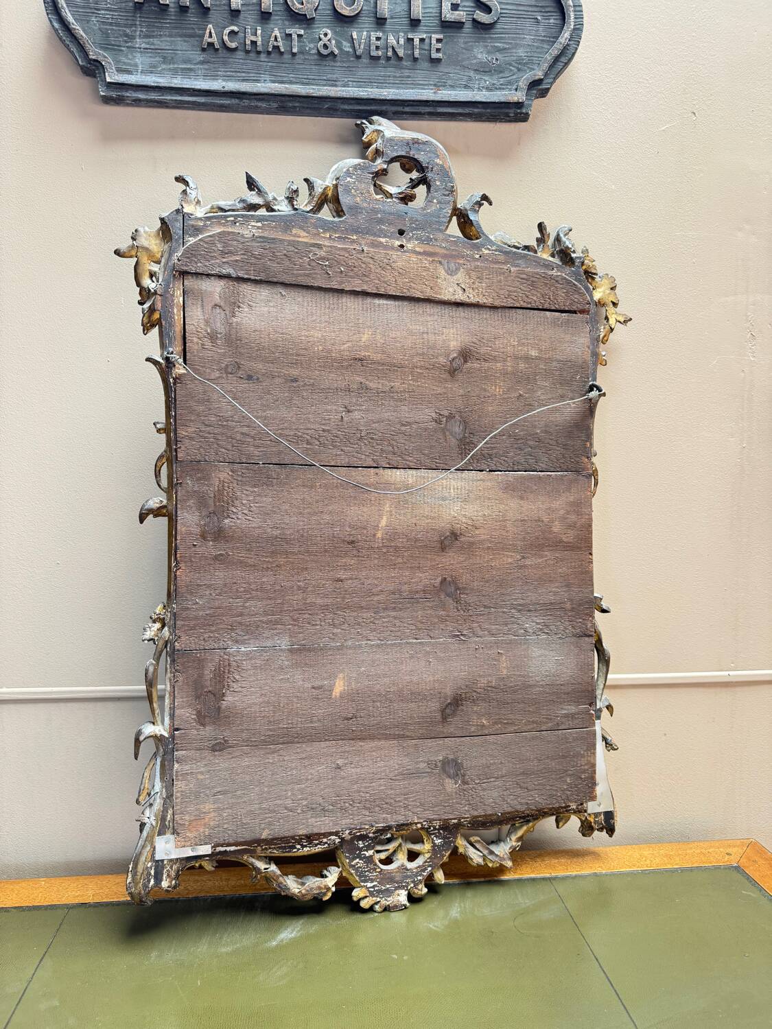Louis XV period wooden and gilded stucco mirror, 18th century