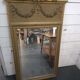Gilded patinated trumeau mirror