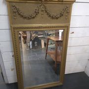 Gilded patinated trumeau mirror