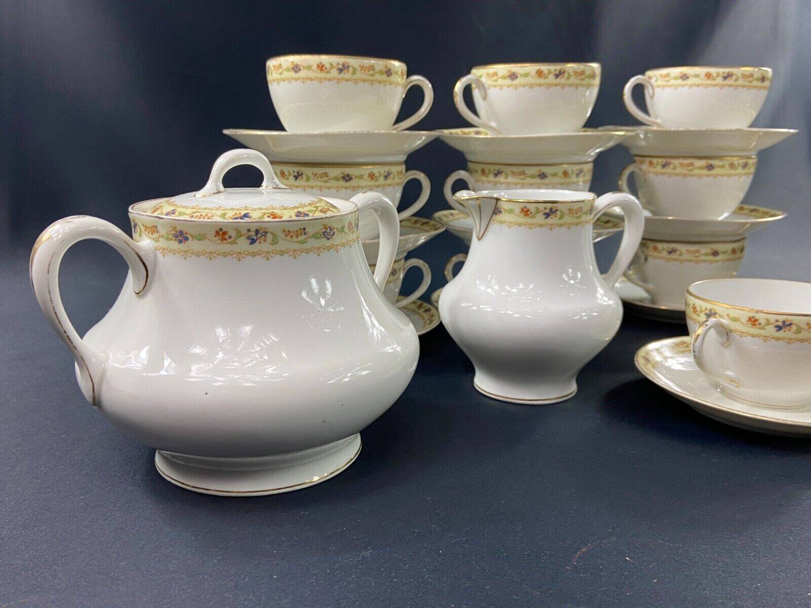 Limoges porcelain tea set Bernardaud Teapot sugar bowl milk pot cups