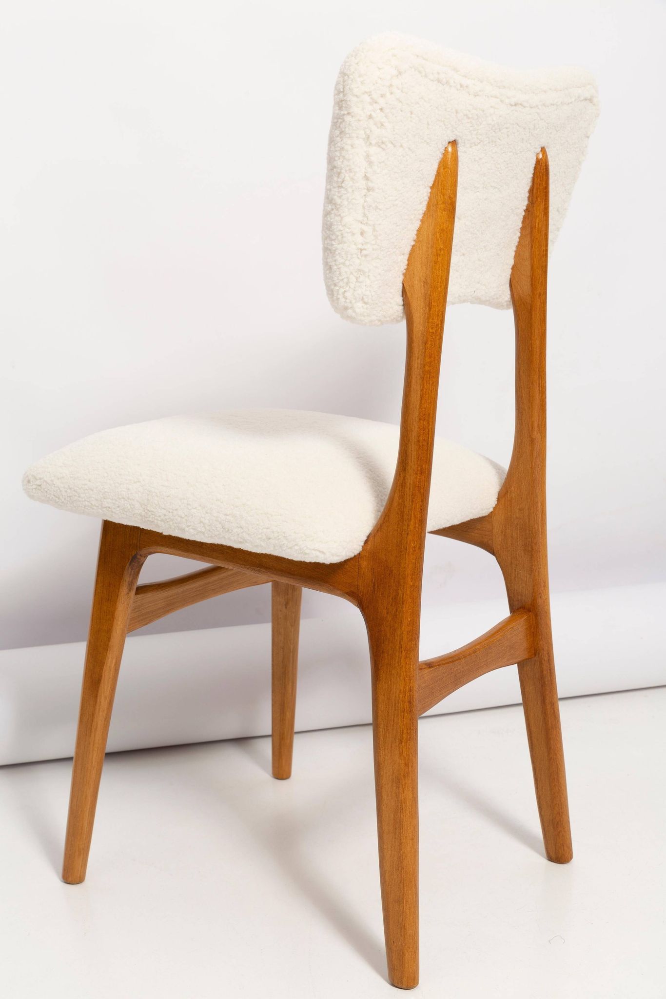 Mid-century "Butterfly" dining chair, light cream boucle, Poland, 1960s