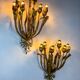 Monumental pair of gilt metal "tulip bouquet" wall sconces, 7 lights, Italy 1950s