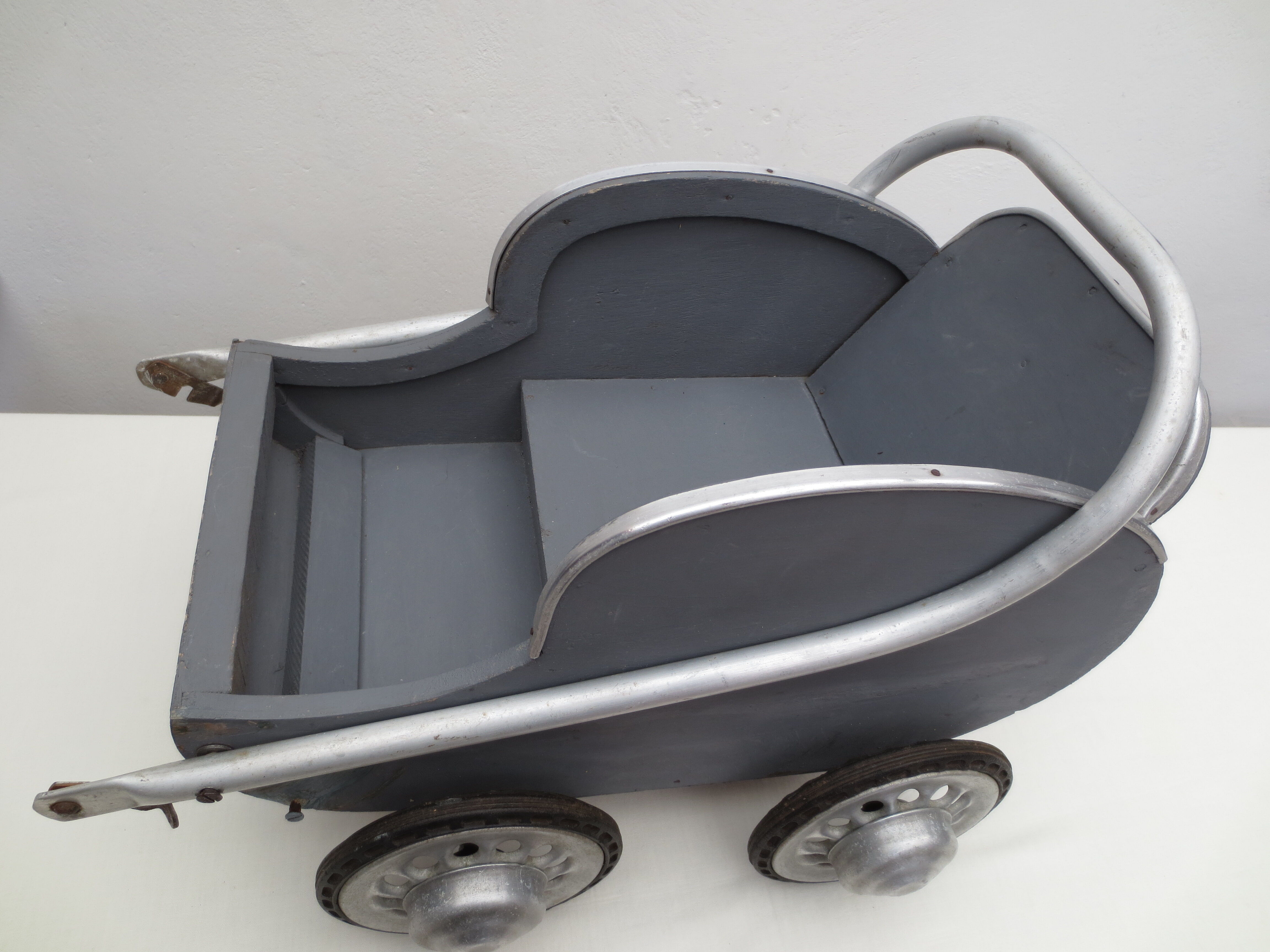40 year old doll stroller, wood and aluminum