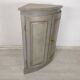 Rustic patinated corner cupboard