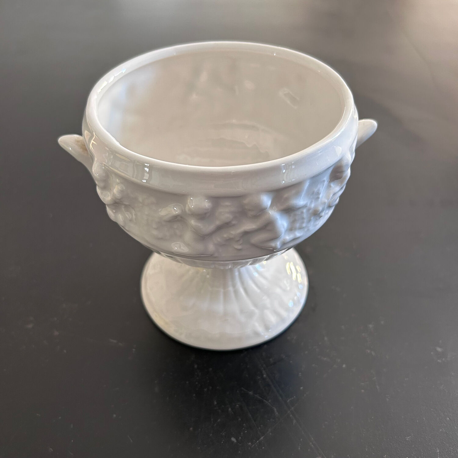 Medici-style vase decorated with cherubs