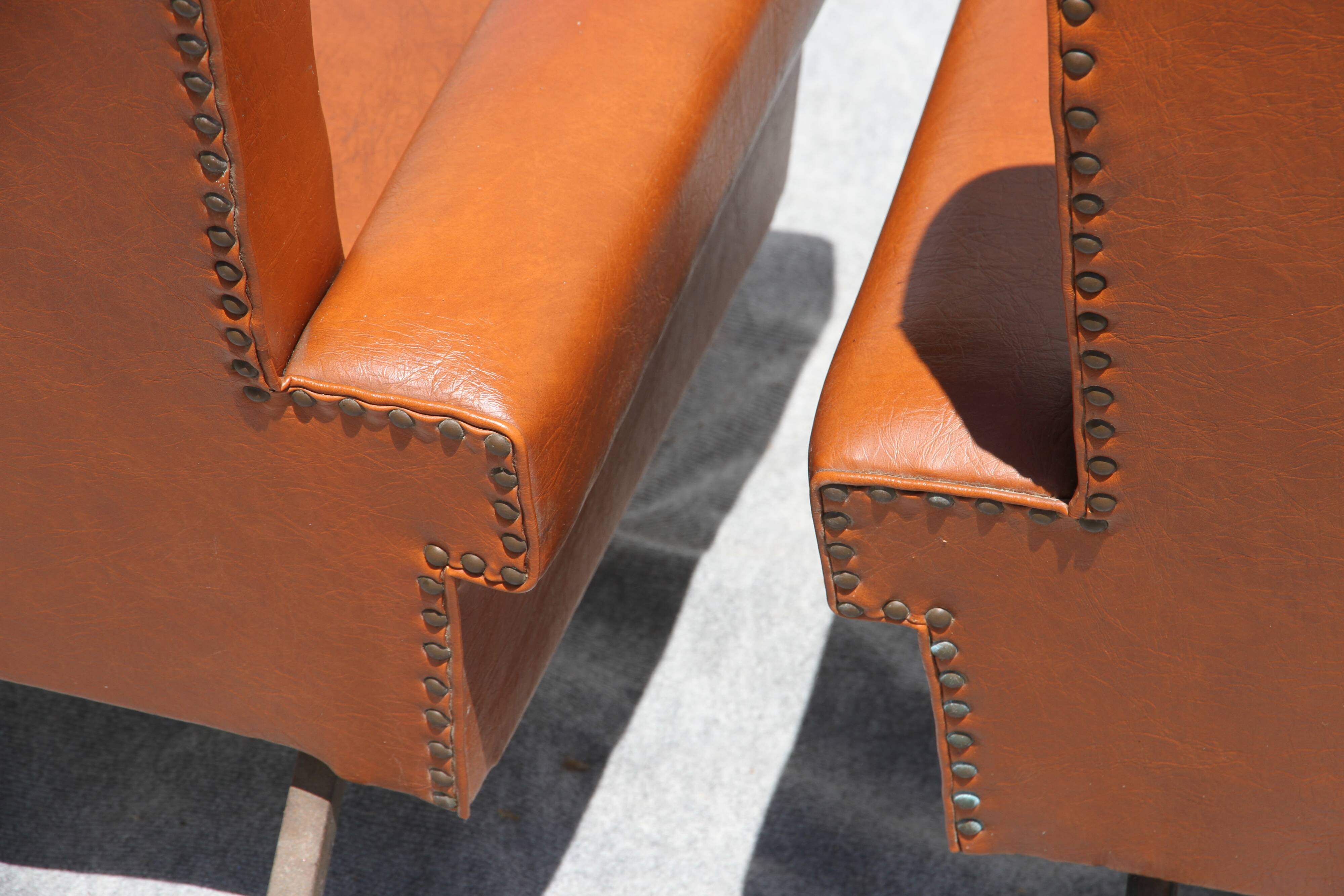 Pair of armchairs in skai, 20th century