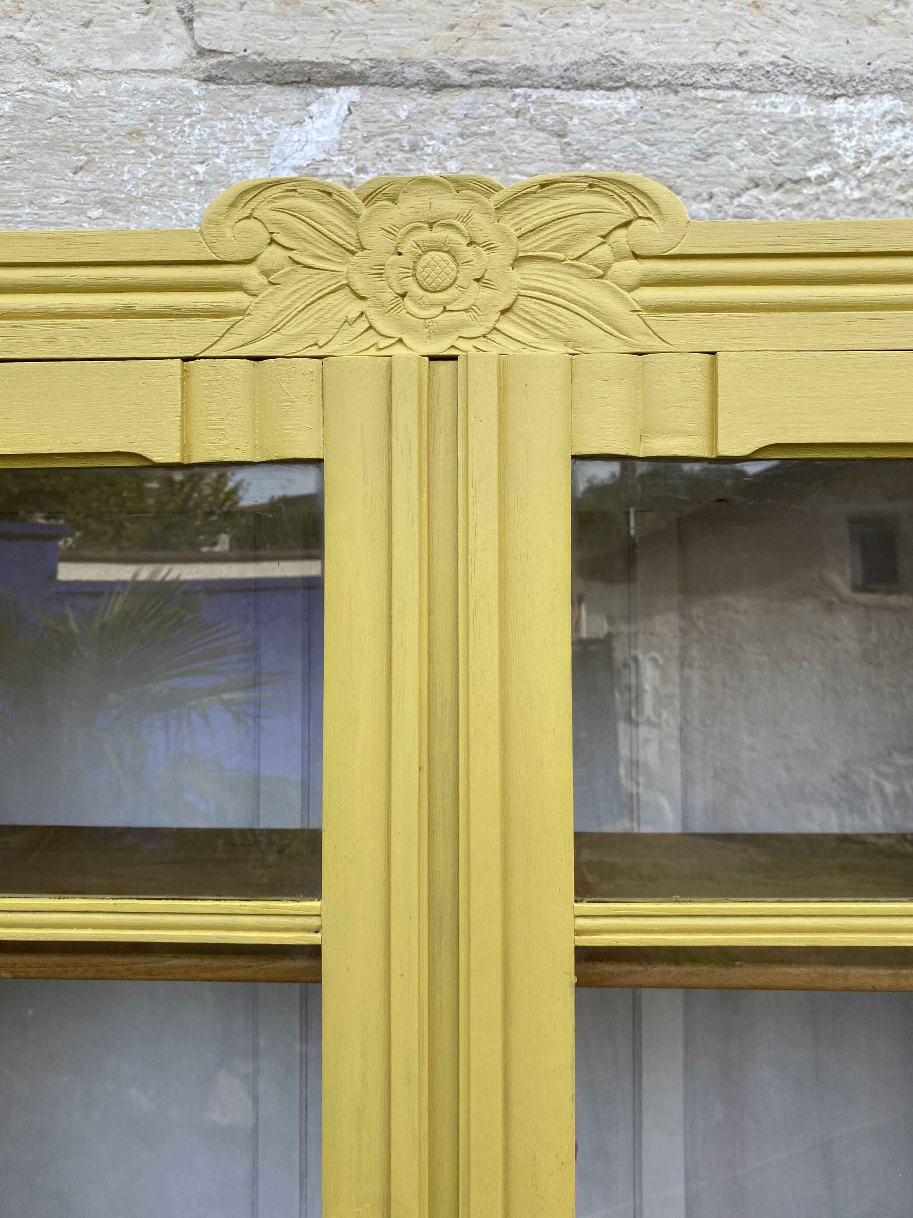 Antique yellow display cabinet