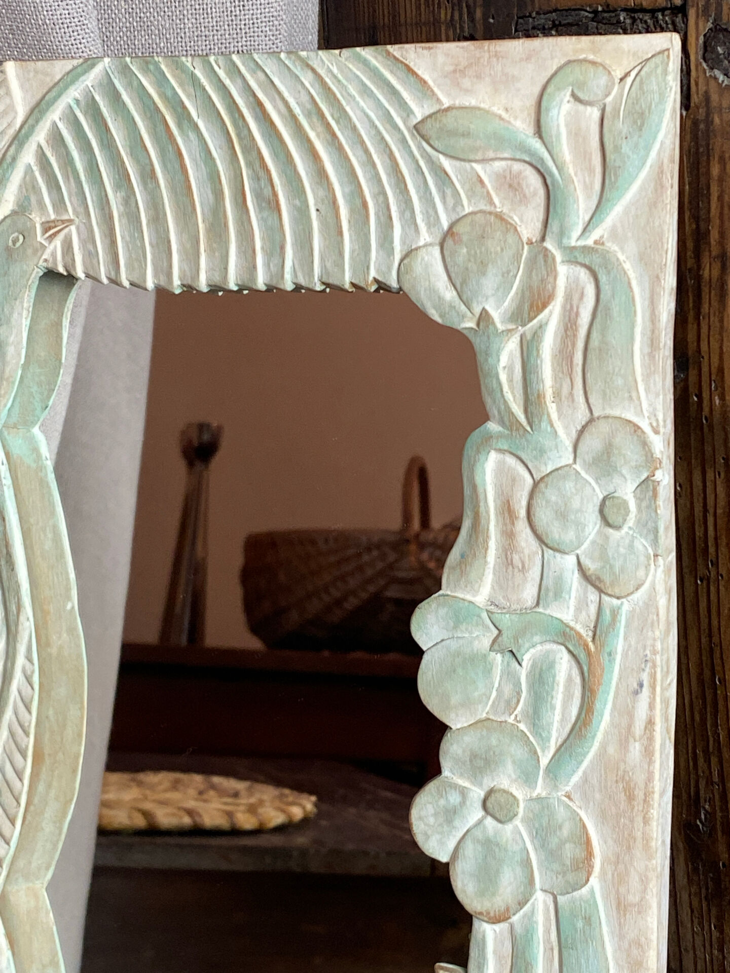 Carved wooden mirror