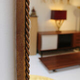 Lighting mirror in gilded wrought iron