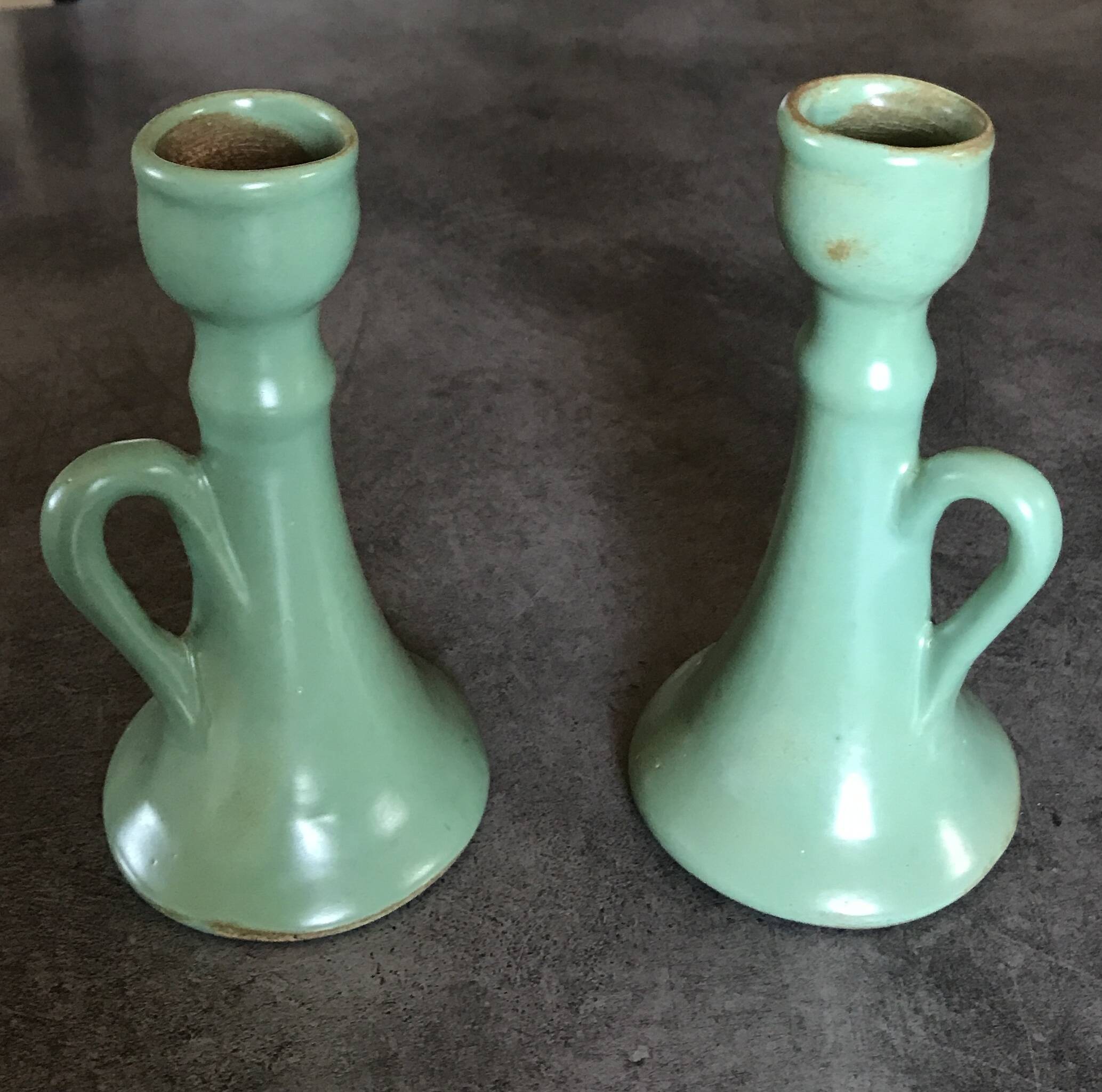 Pair of vintage table candle holders in green enameled ceramic