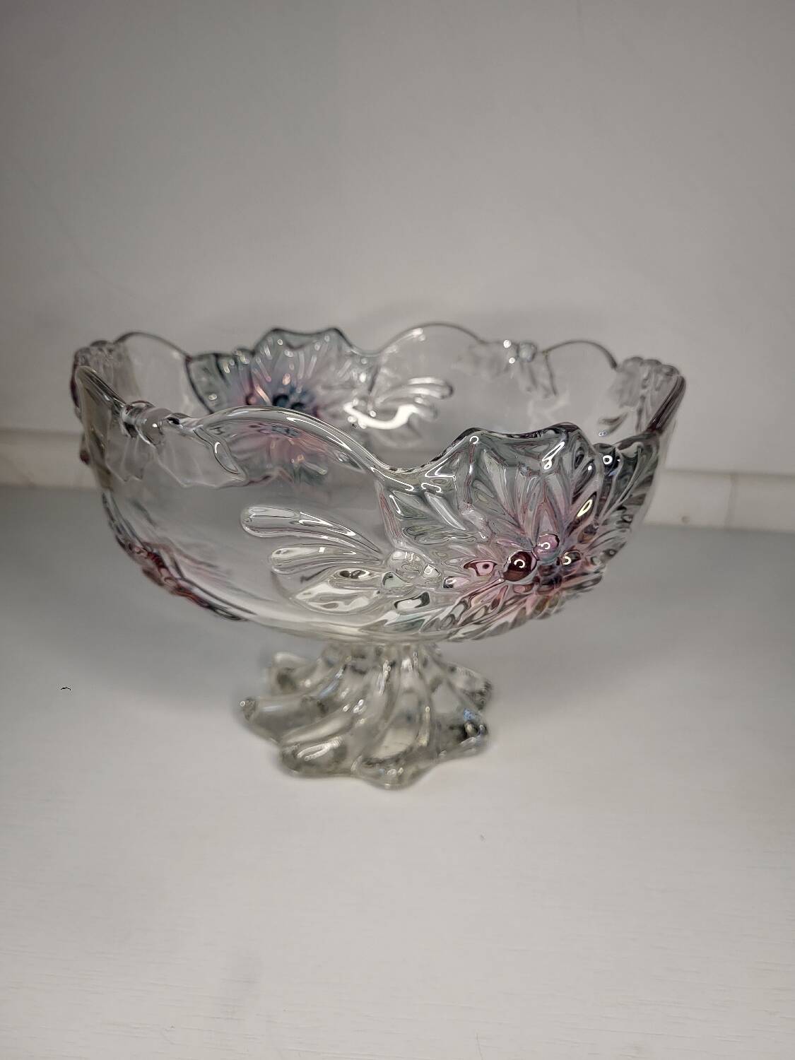 Footed glass fruit bowl