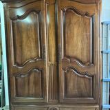 Armoire noyer cintrée