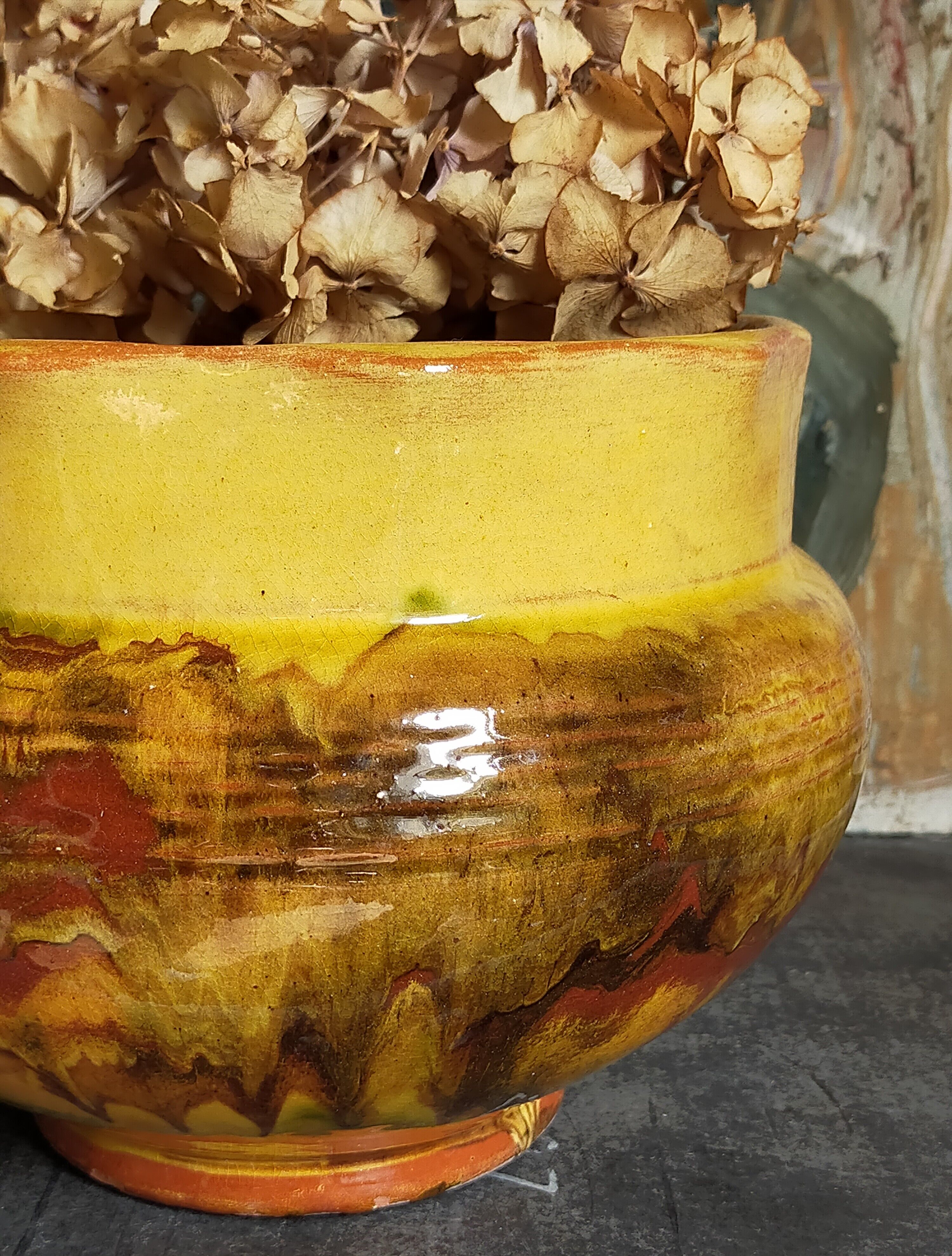 Old provencal pot cover in glazed terracotta