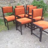 Series of 6 vintage chairs in orange fabric and black lace-up.