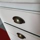 Patinated wooden chest of drawers