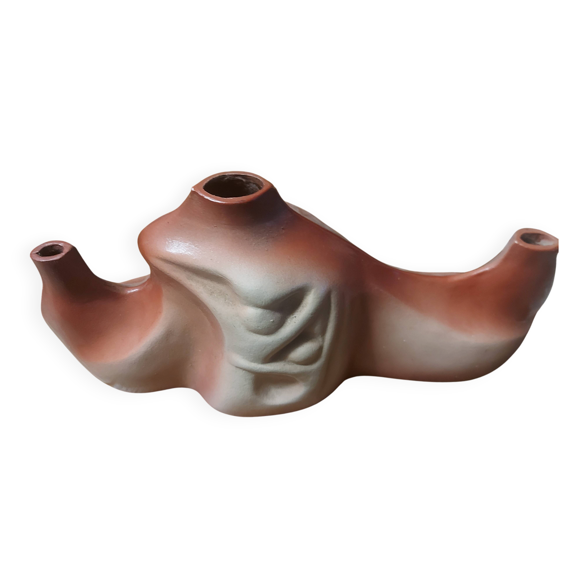 Decorative ceramic vase with organic shapes in Art Nouveau style.