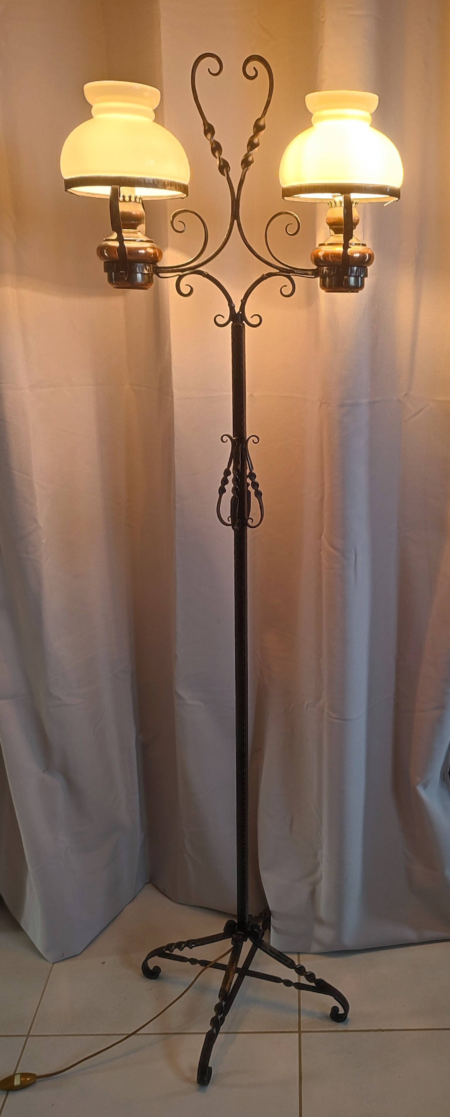Antique double globe opaline floor lamp, wrought iron, rustic vintage style.