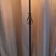 Antique double globe opaline floor lamp, wrought iron, rustic vintage style.