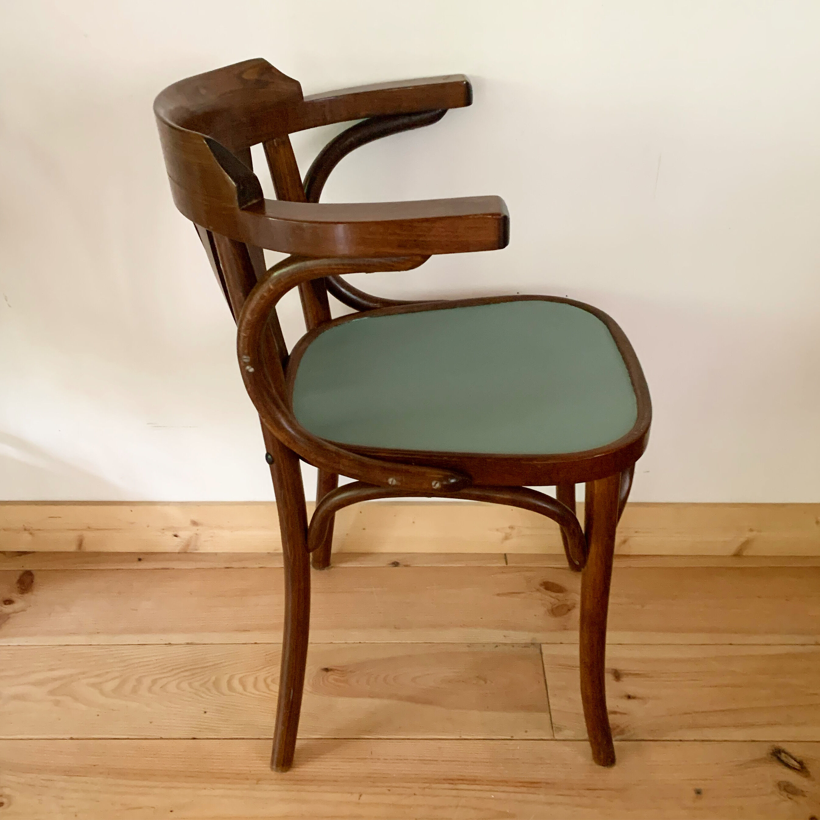 Vintage bistro chair with armrests