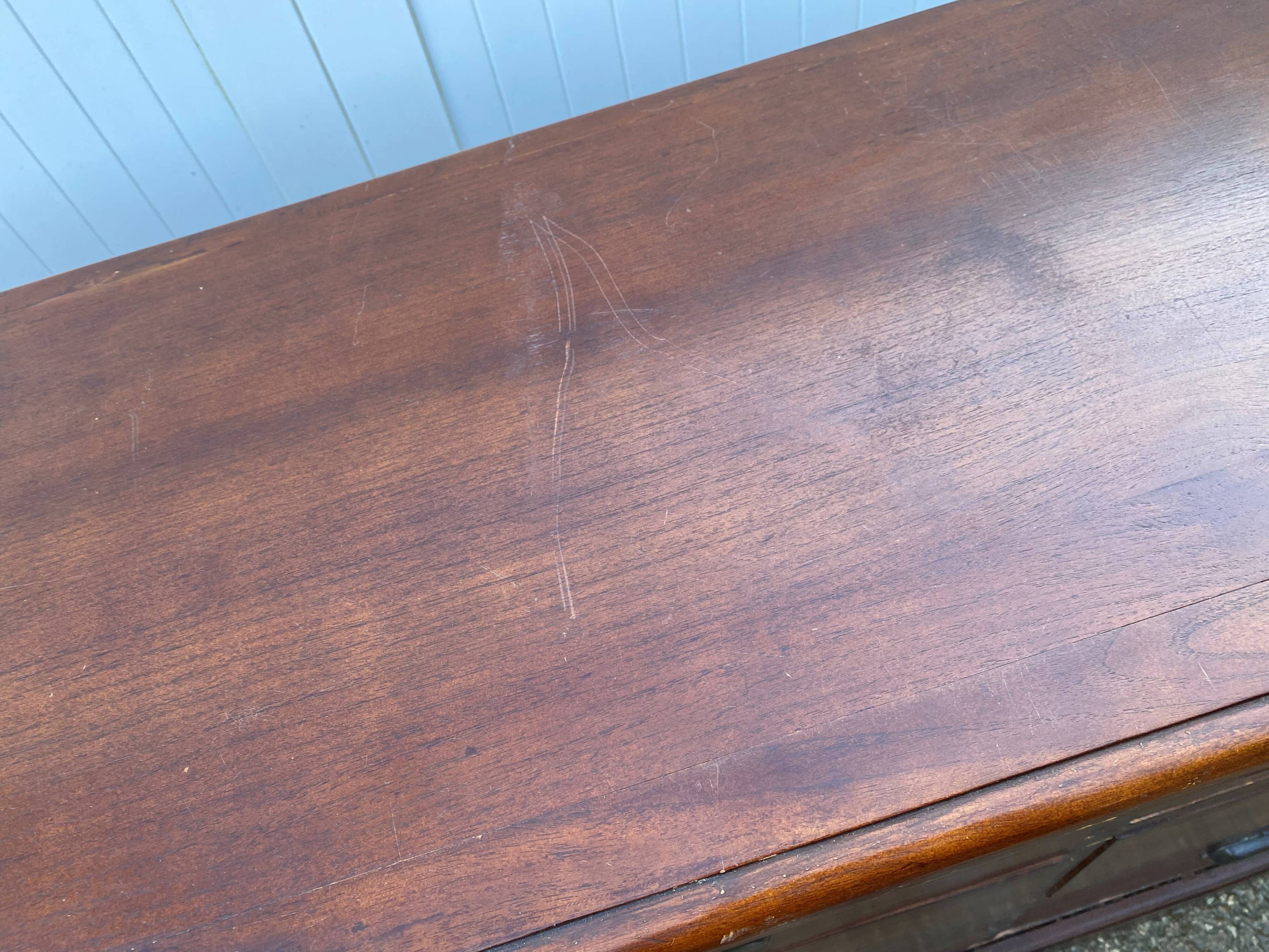 Old and authentic trade storage unit counter with 12 large drawers in cherry wood 1950