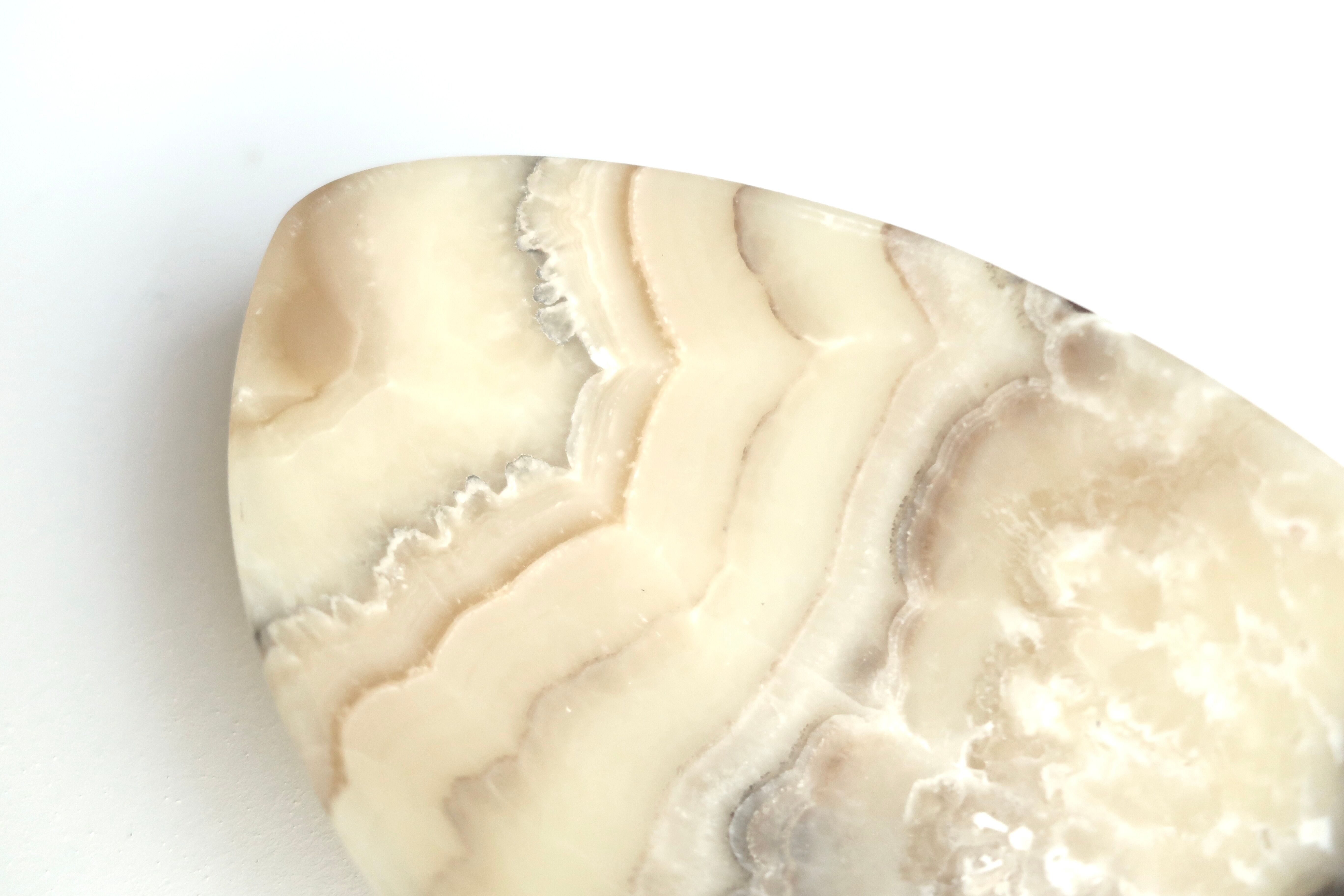 Mexican tidy in carved stone, 70s