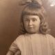 Old photograph, young girl with ribbon, 19th century