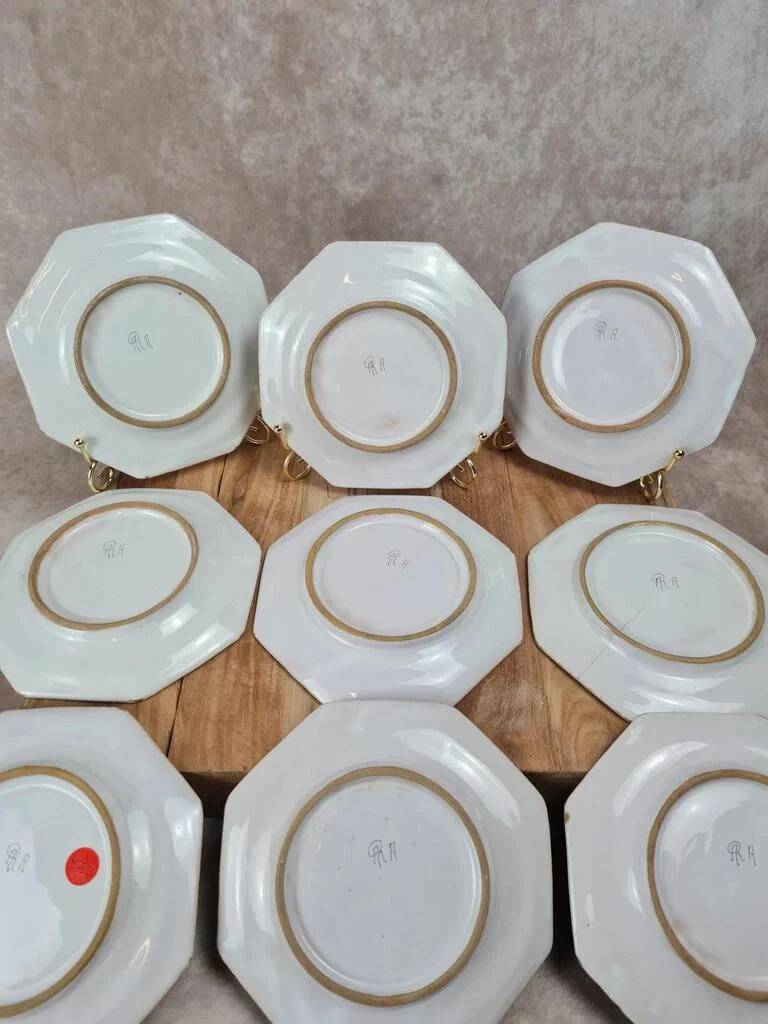 Set of 12 small antique plates by Alfred Renoleau, different designs.