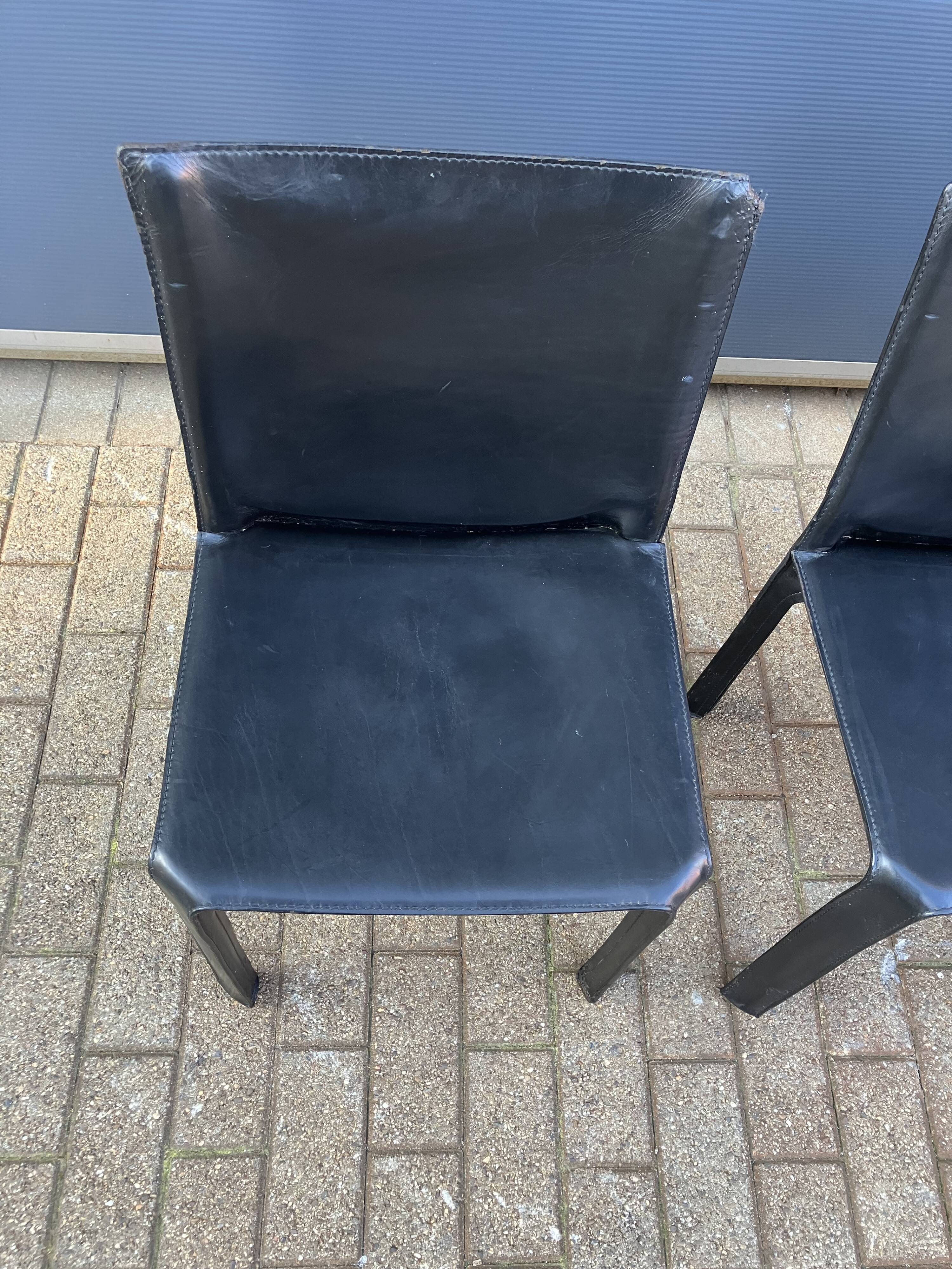 4 black Cassina Cab chairs by Mario Bellini