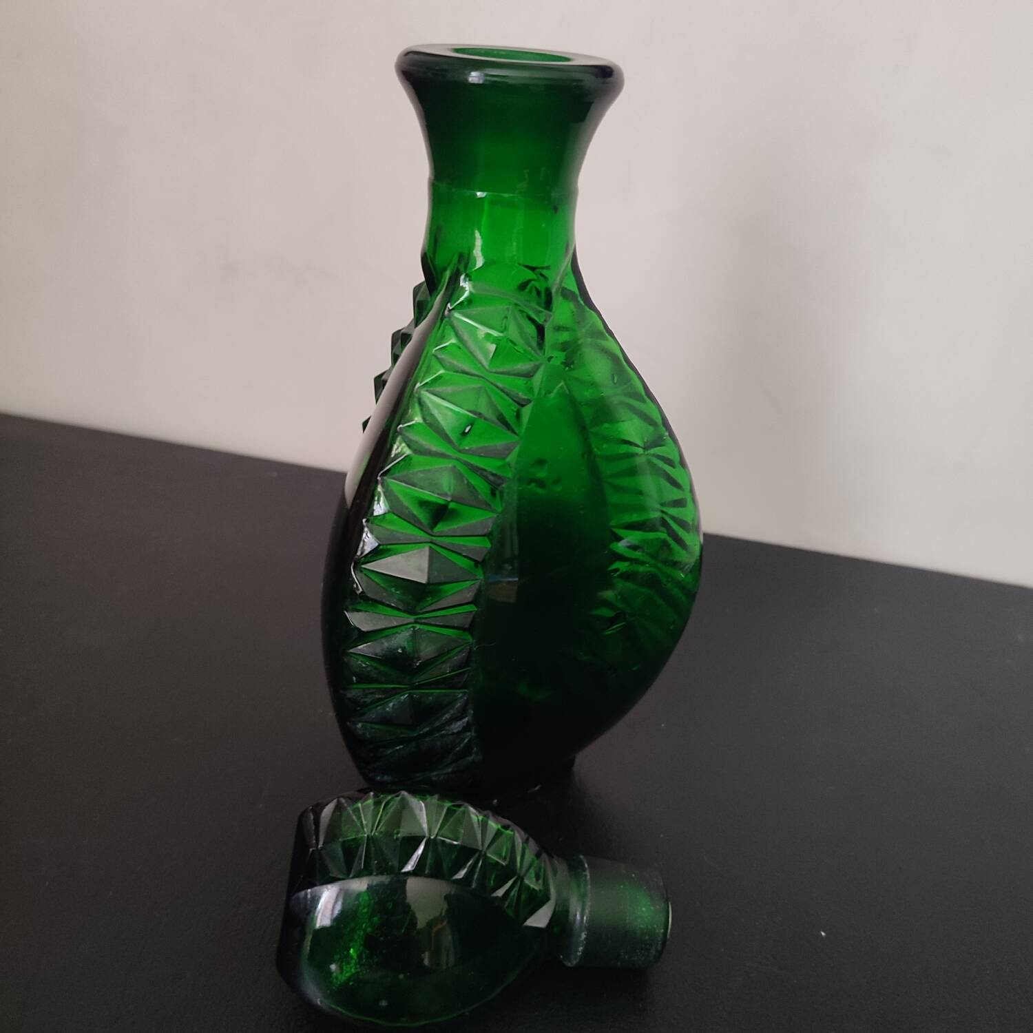 Vintage green carafe in chiseled glass