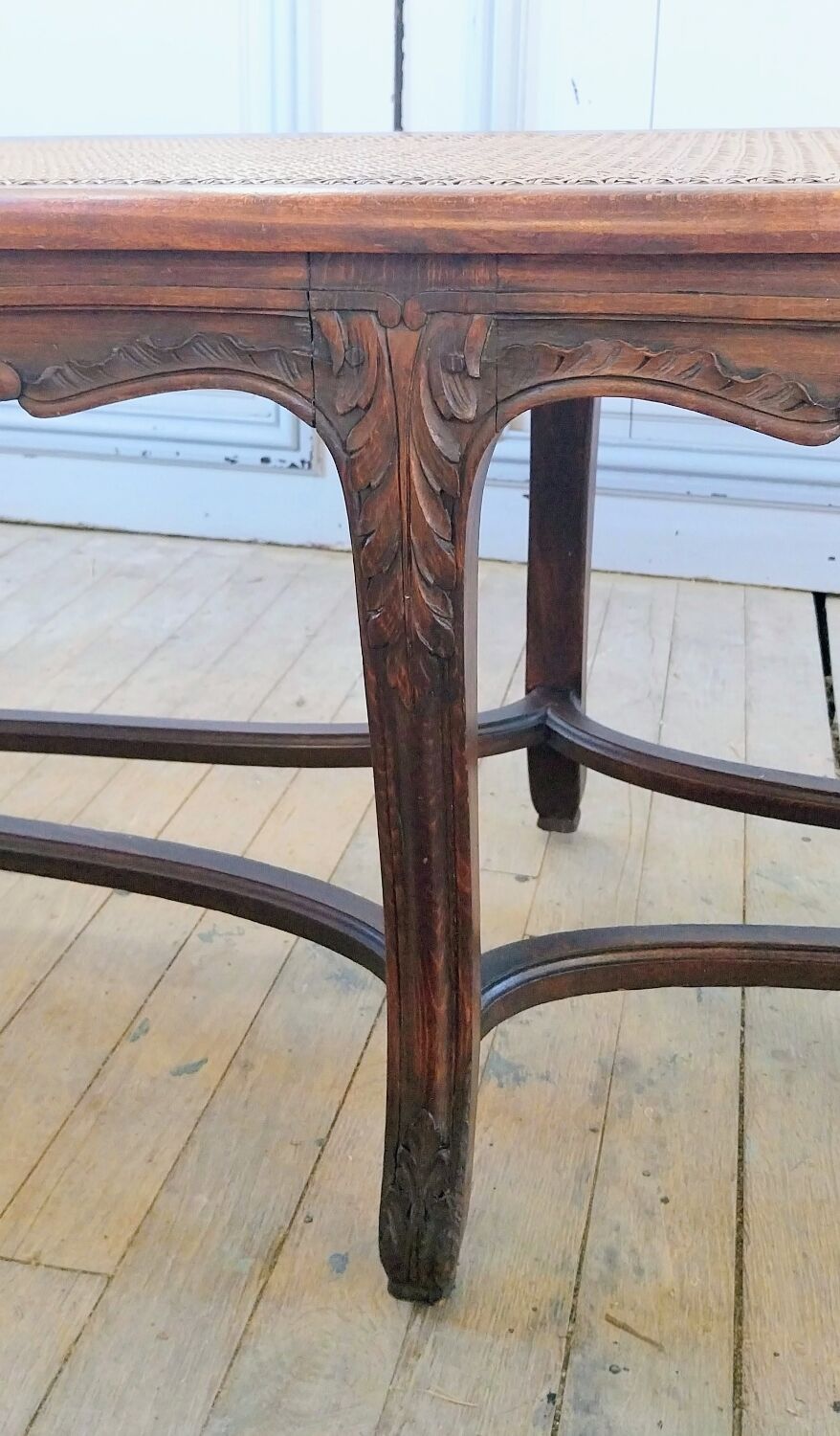 Louis XV style bench with cross-braced design