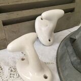 Pair of porcelain hooks