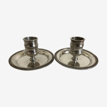 Two silver metal candlesticks