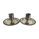 Two silver metal candlesticks