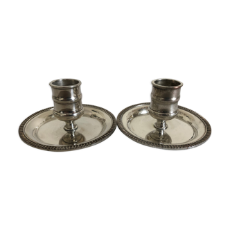 Two silver metal candlesticks