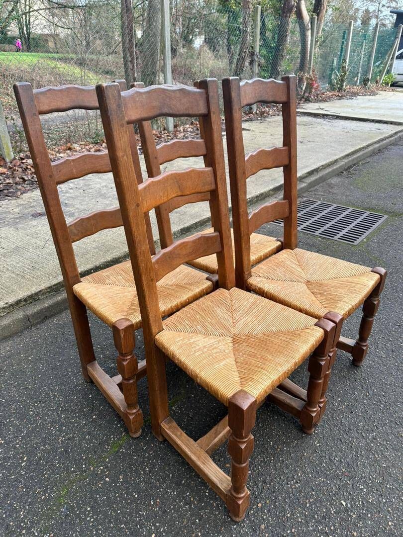 4 dining chairs made of solid wood with straw seats, farmhouse style, medium oak, 20th century, 110cm.