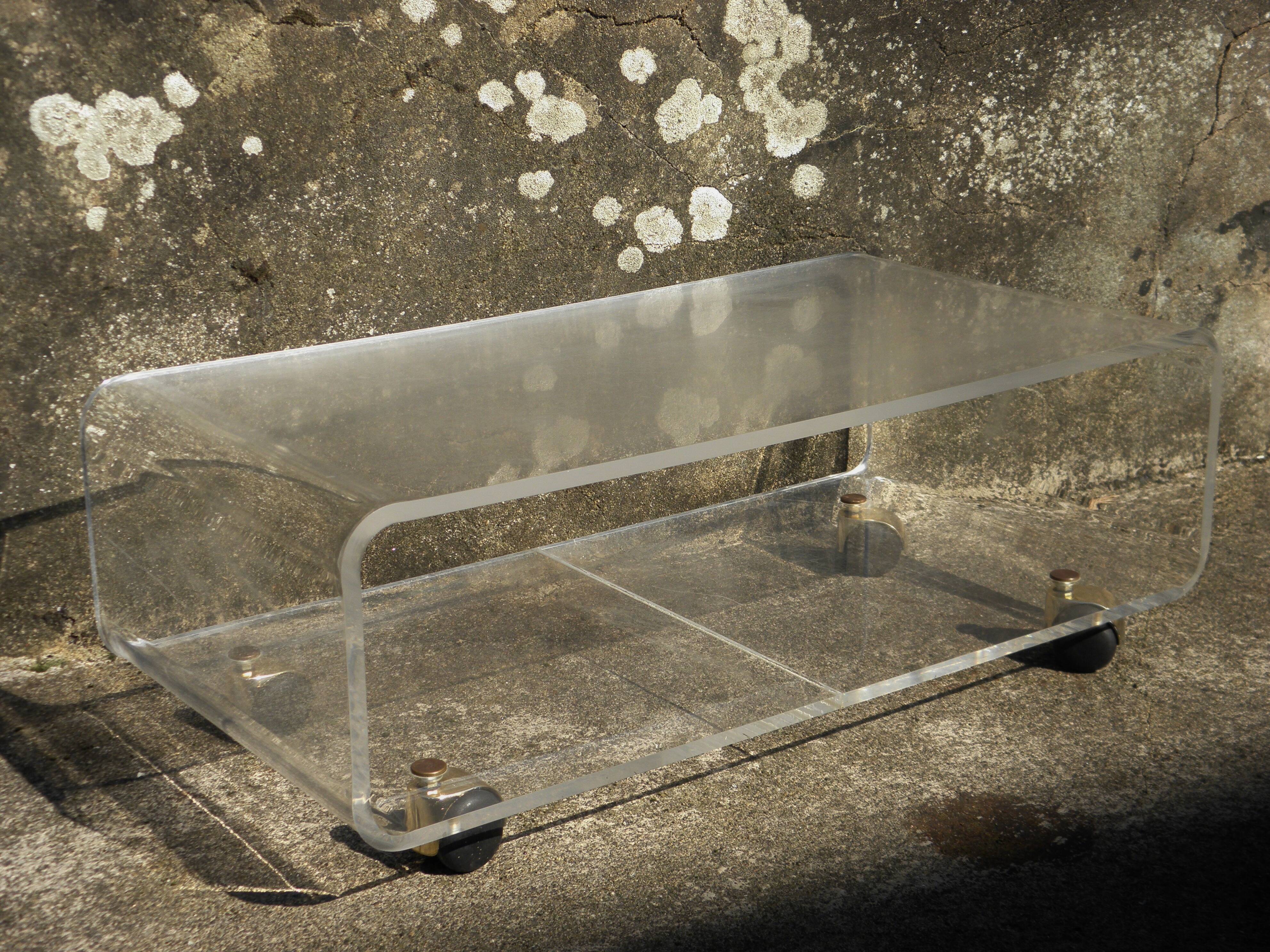 Plexiglass coffee table on wheels