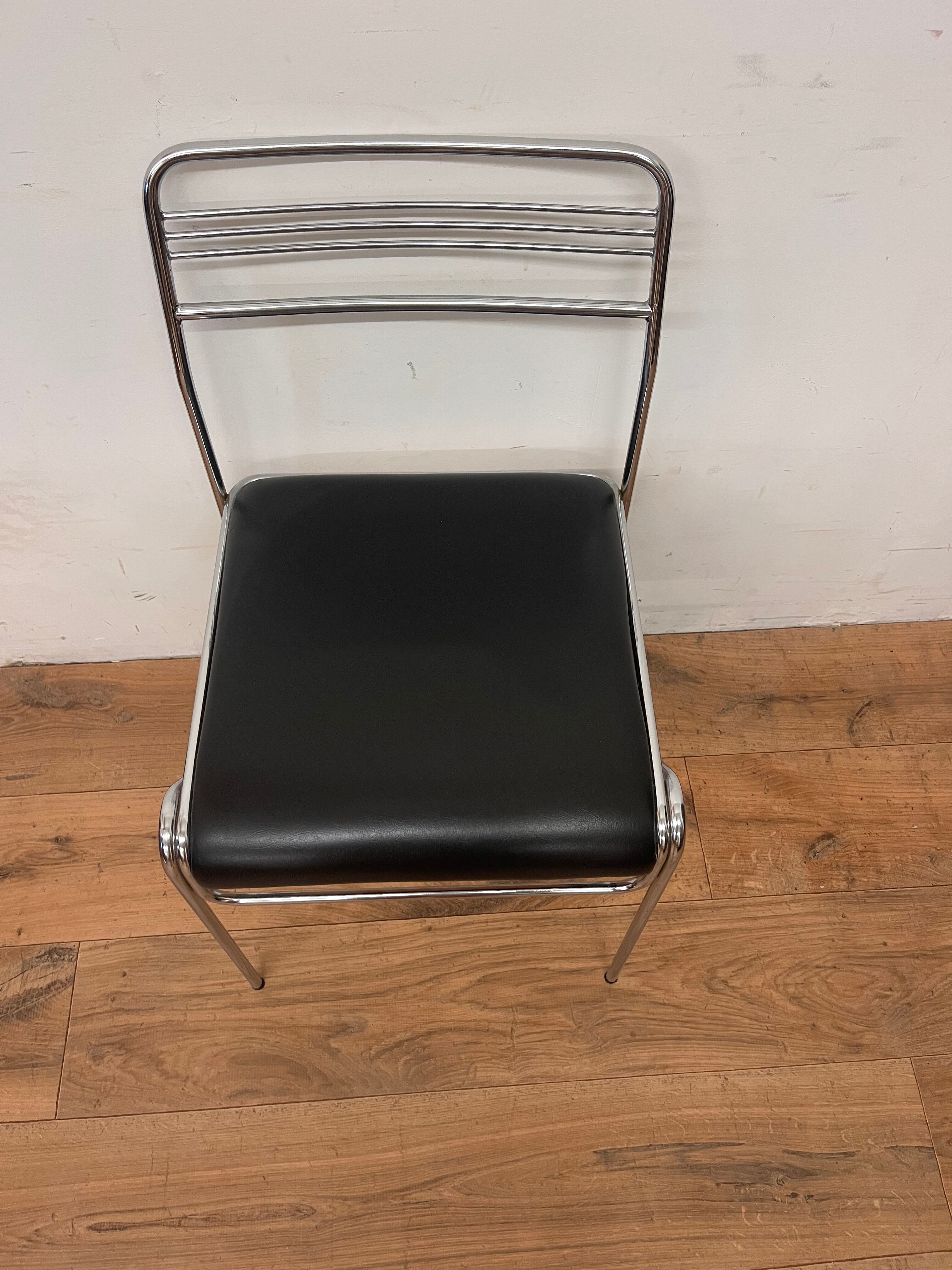Three chrome and skai chairs from the 70s