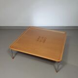 Rare coffee table 110 x 110 x height 35 cm with 8 flange wooden / cork caps in the glass top.