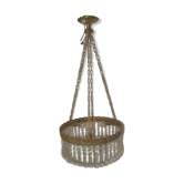 circular chandelier with a brass frame and crystal drops