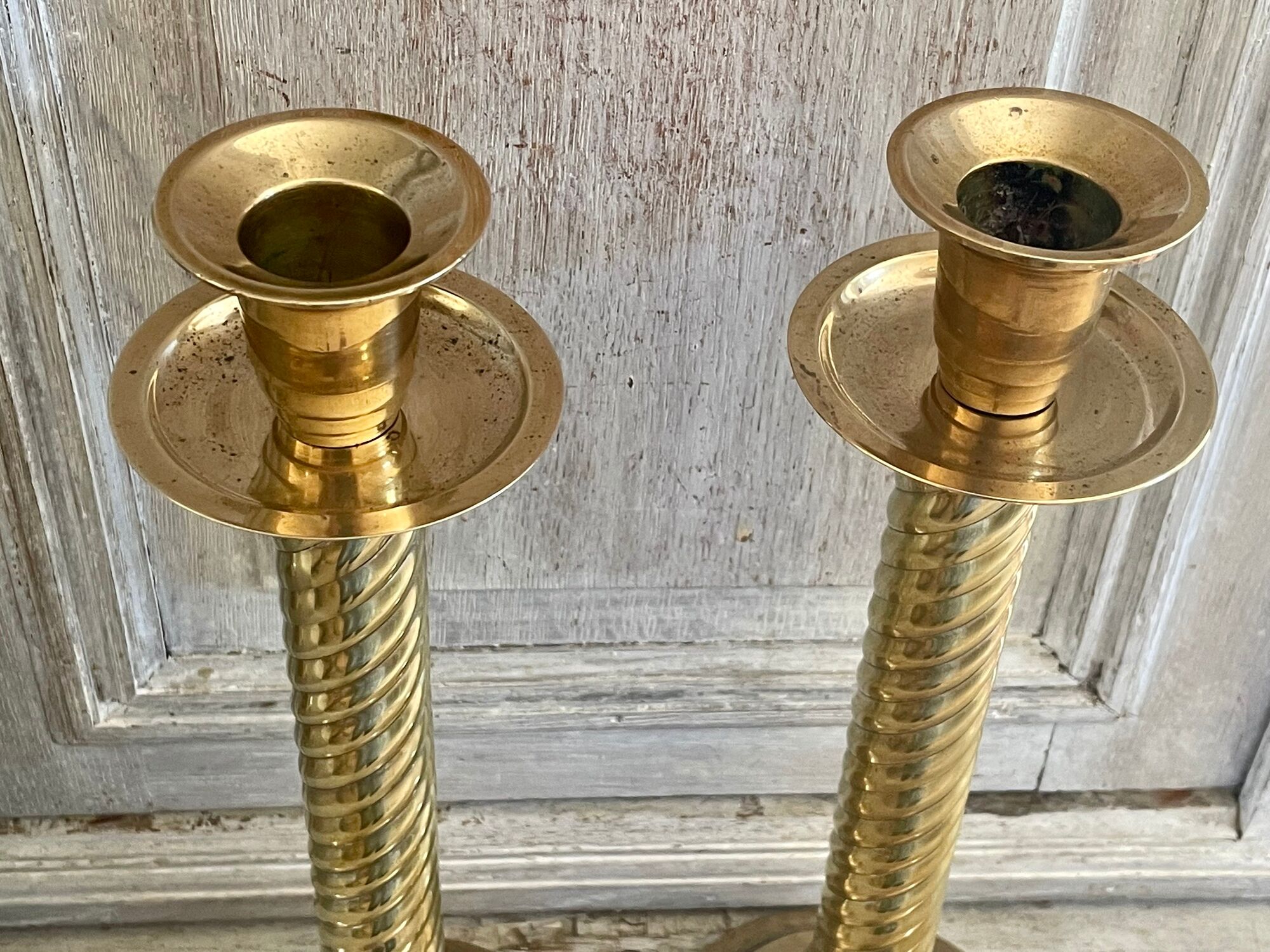 Pair of twisted brass column candle holders
