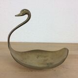 Empty golden brass swan pocket