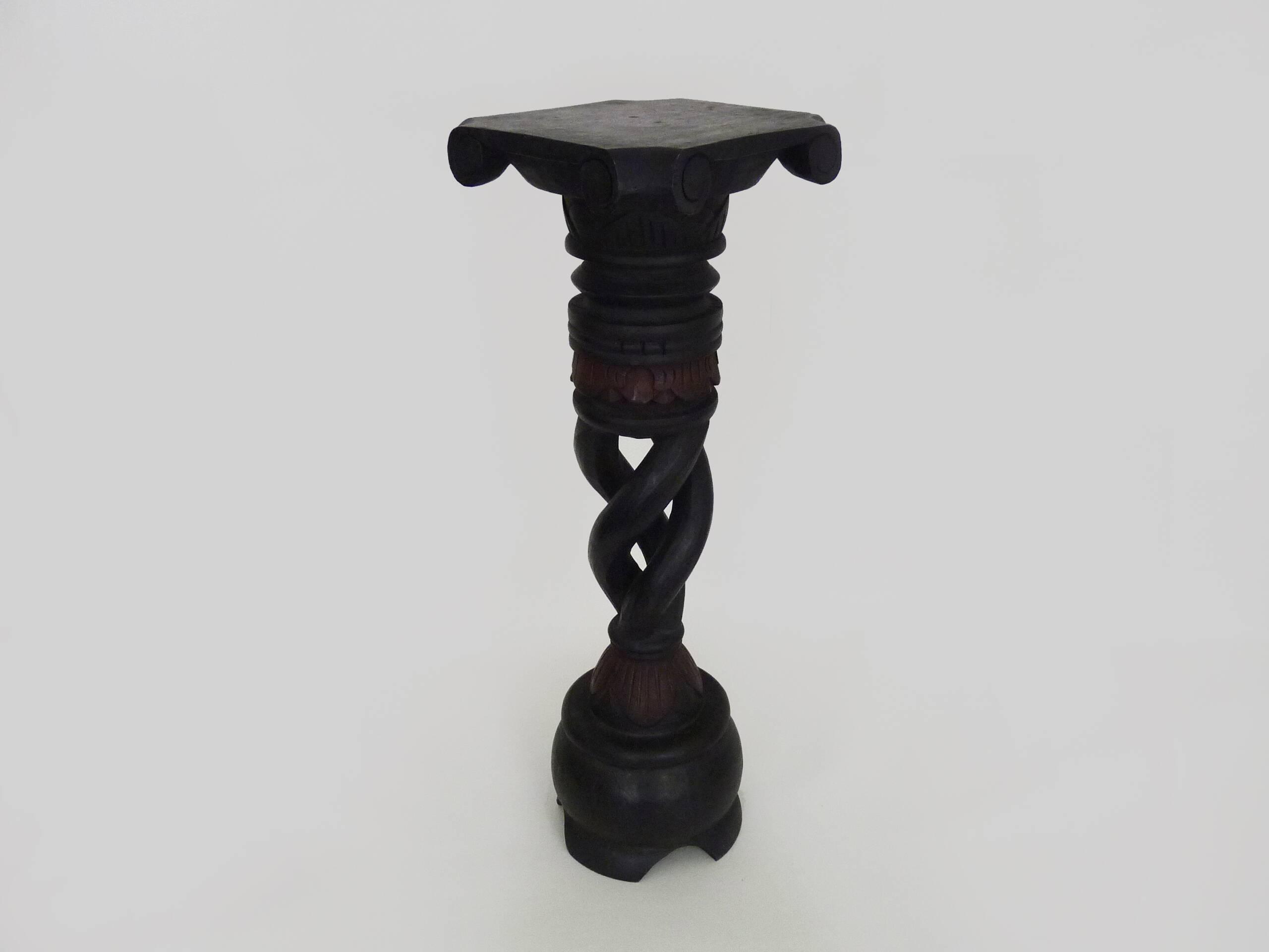 Twisted and engraved blackened wooden pedestal. 1960s 70s.