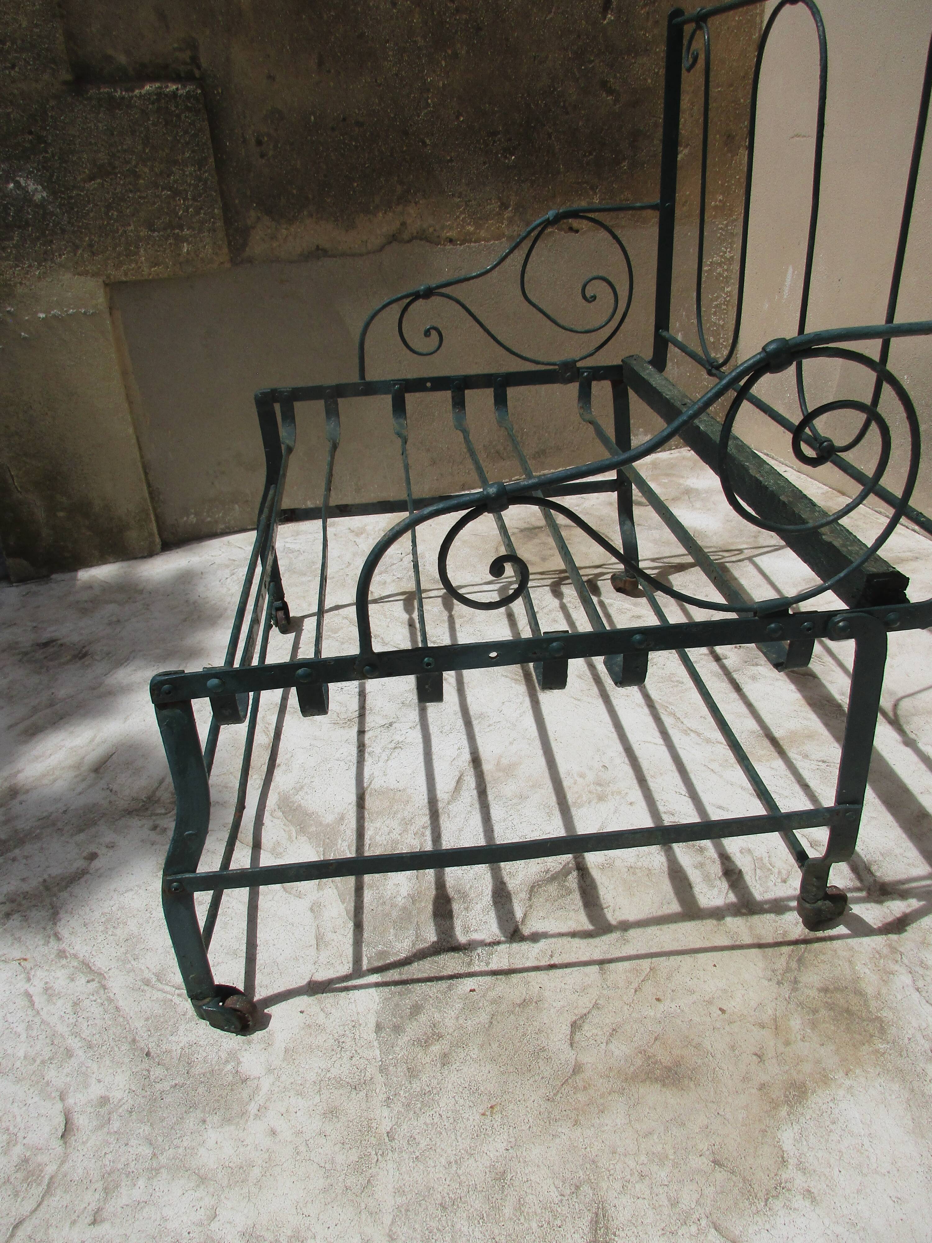 Pair of iron garden chairs forge