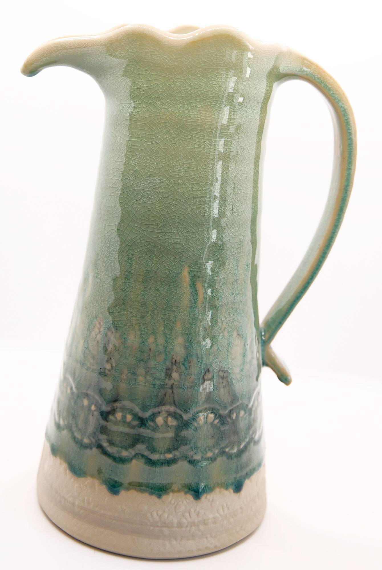 Handcrafted XL pitcher in mint green enameled stoneware
