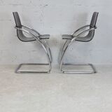 Pair of chairs by Yves Christin, tubular steel, purple plexiglass. Ed. Airborne, France cira 1970