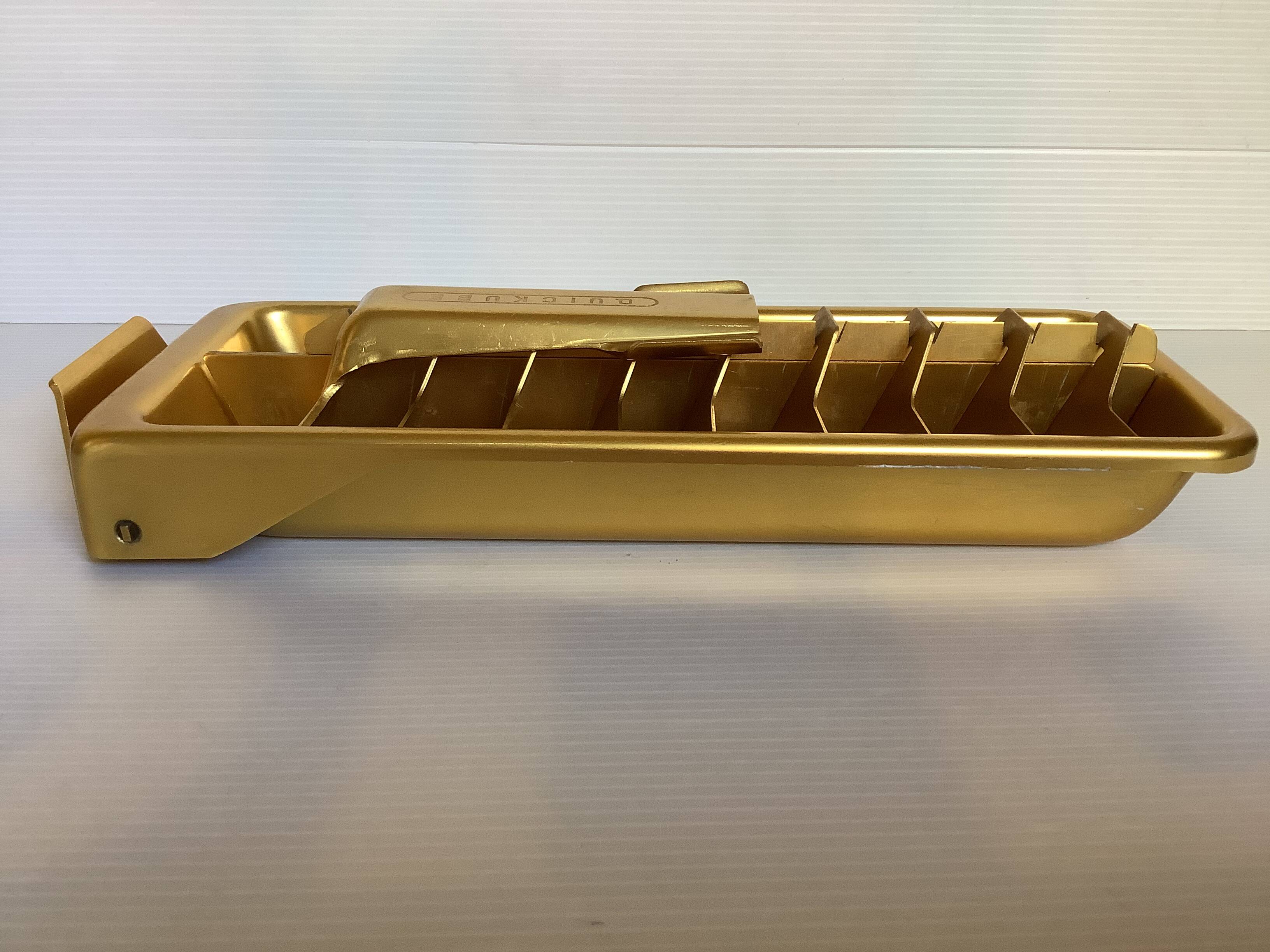 Old gold metal ice cube tray